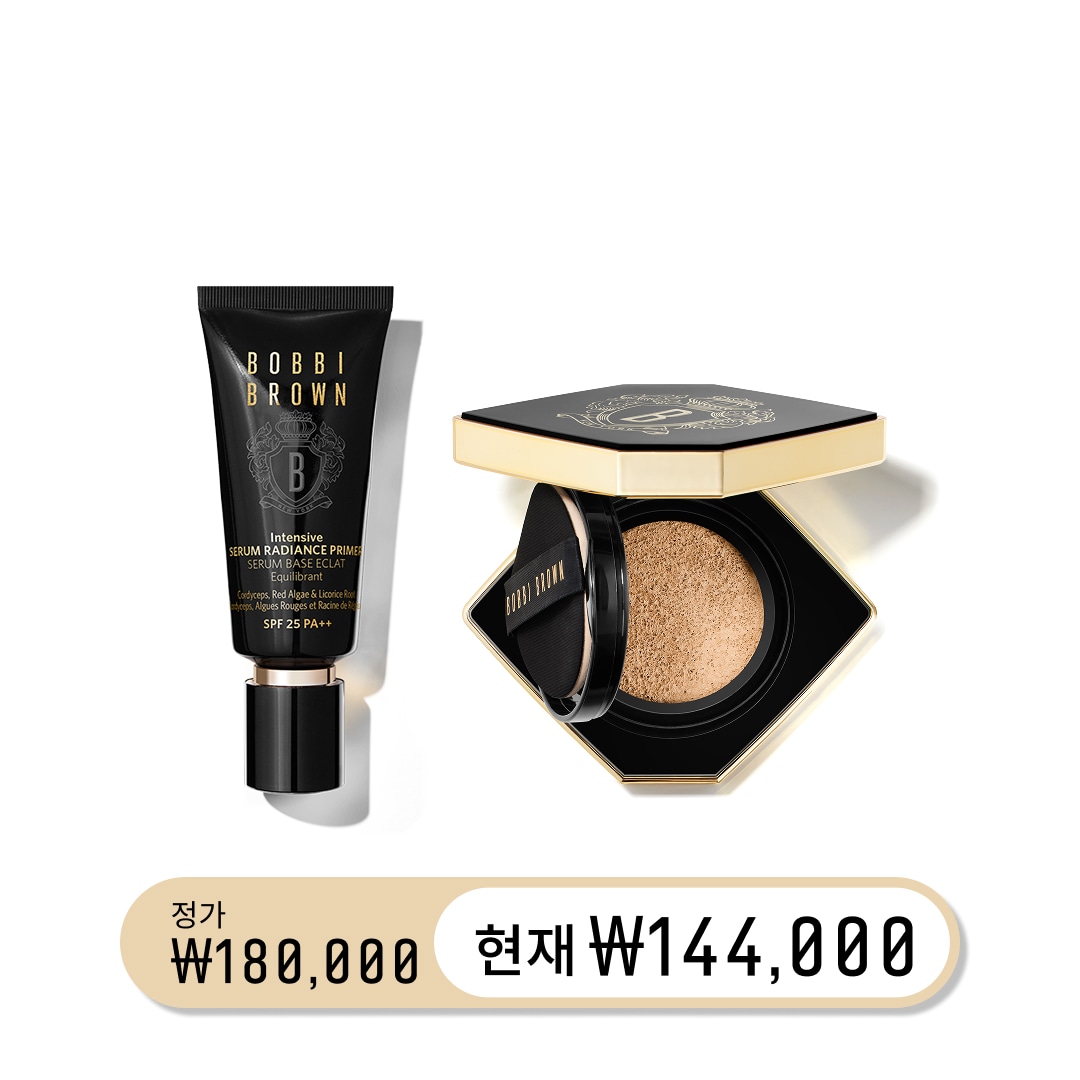 Close up of model eye showcasing defined brows and a natural, shimmery eye look